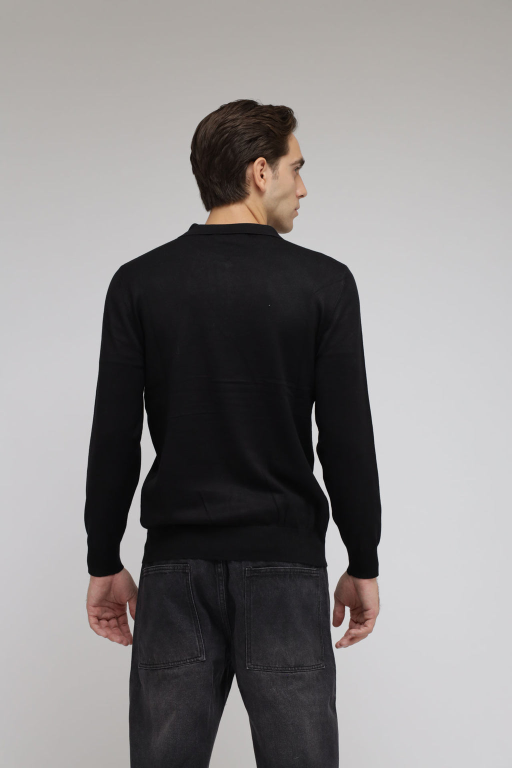 Polo con zip in maglia