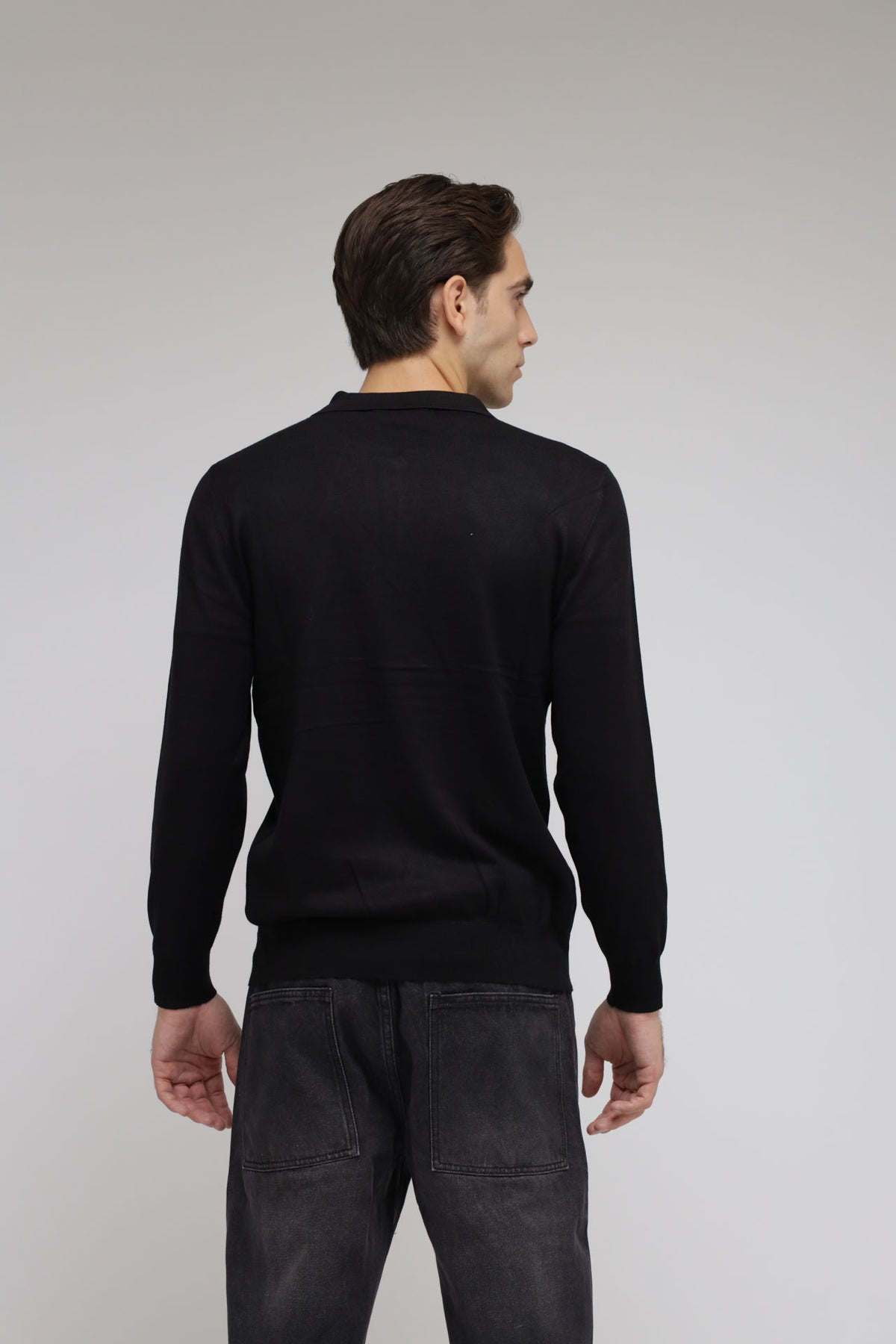 Polo con zip in maglia