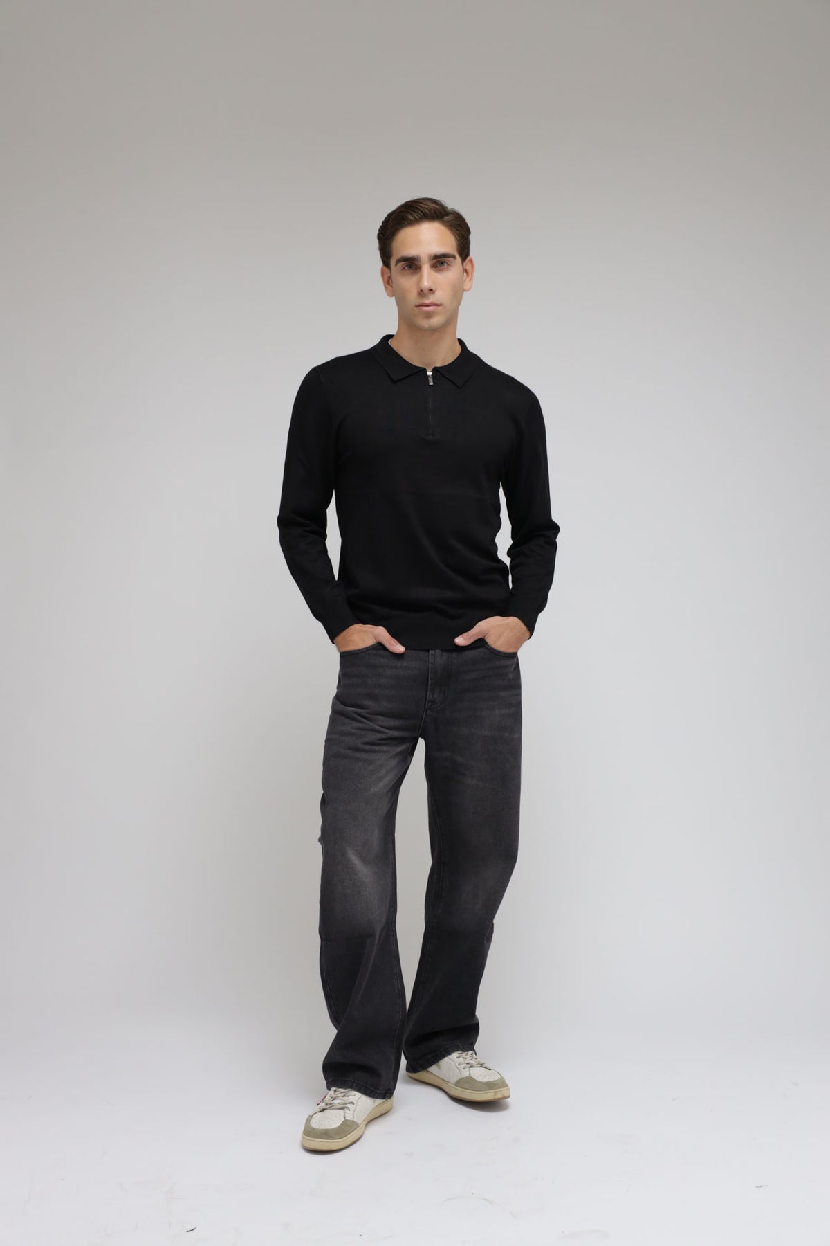 Polo con zip in maglia