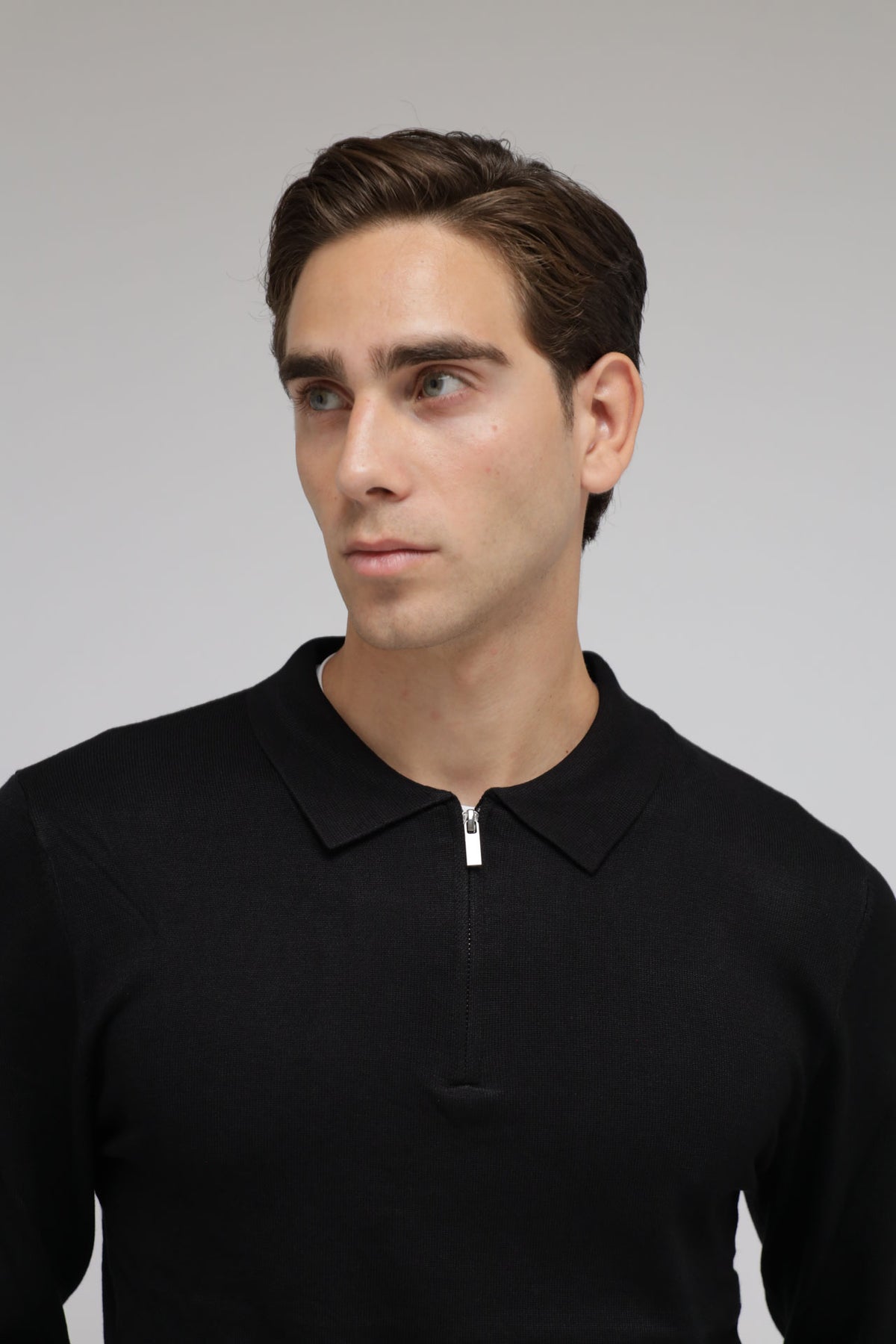Polo con zip in maglia