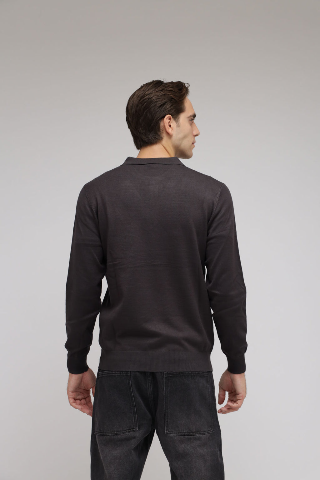 Polo con zip in maglia