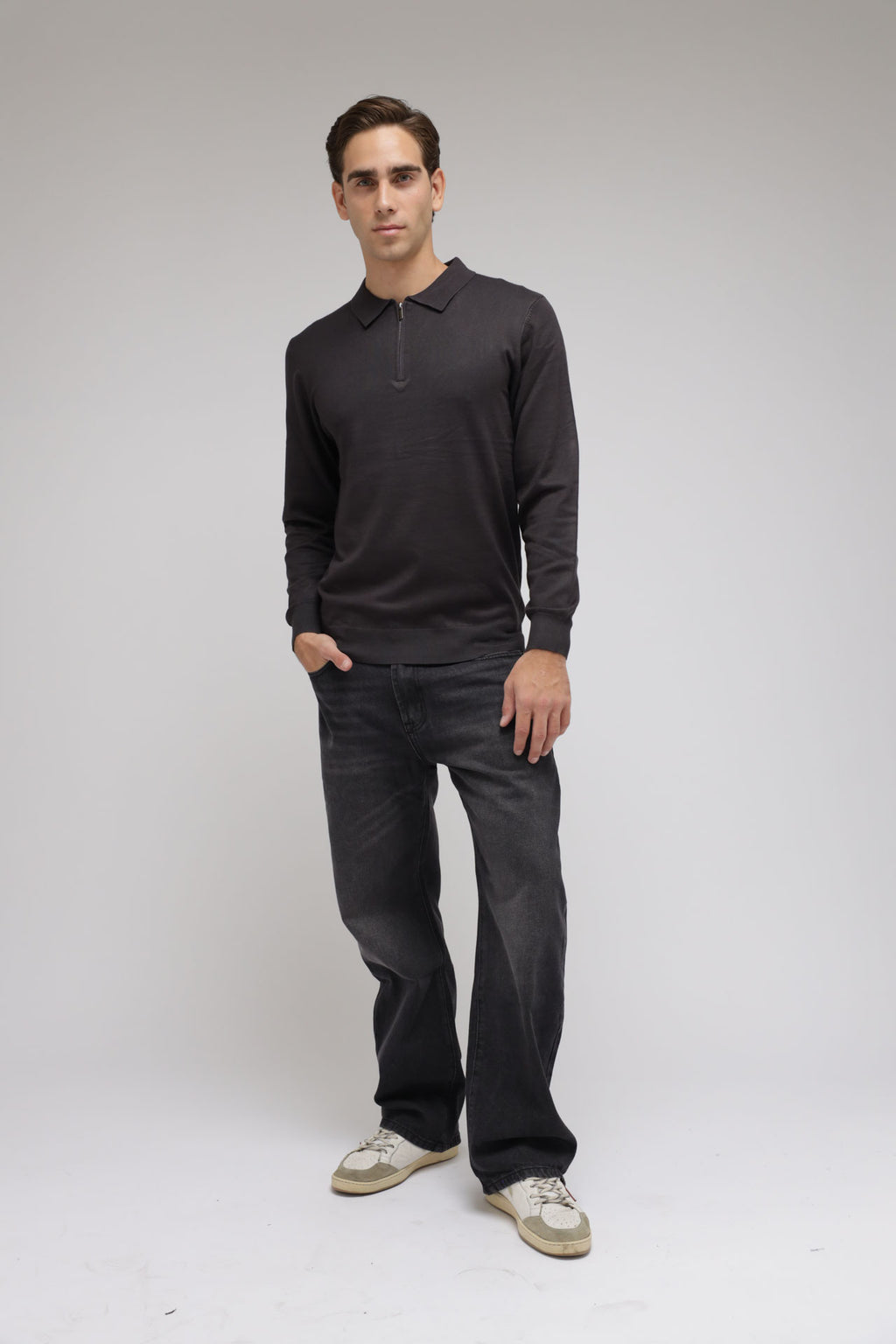 Polo con zip in maglia