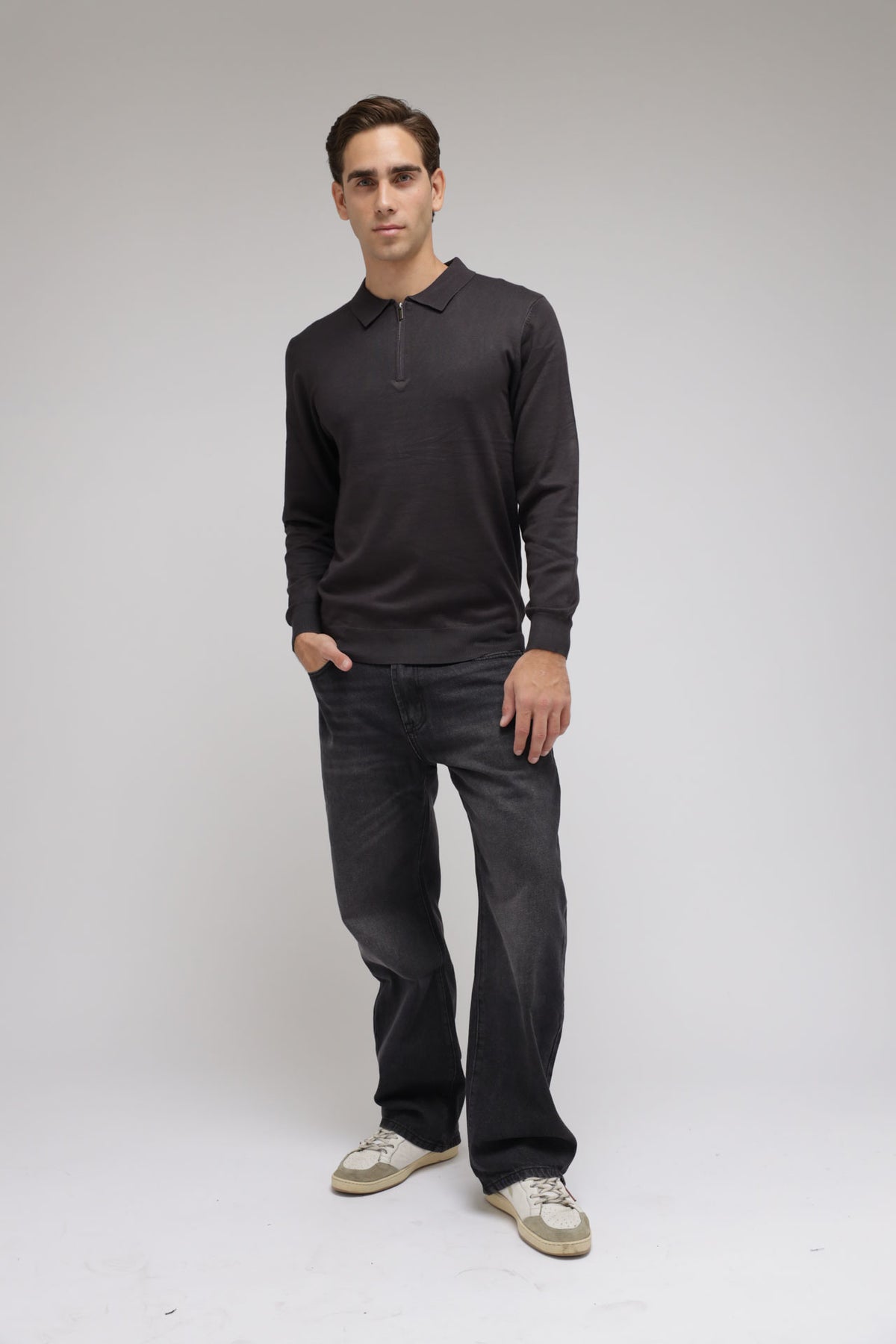 Polo con zip in maglia