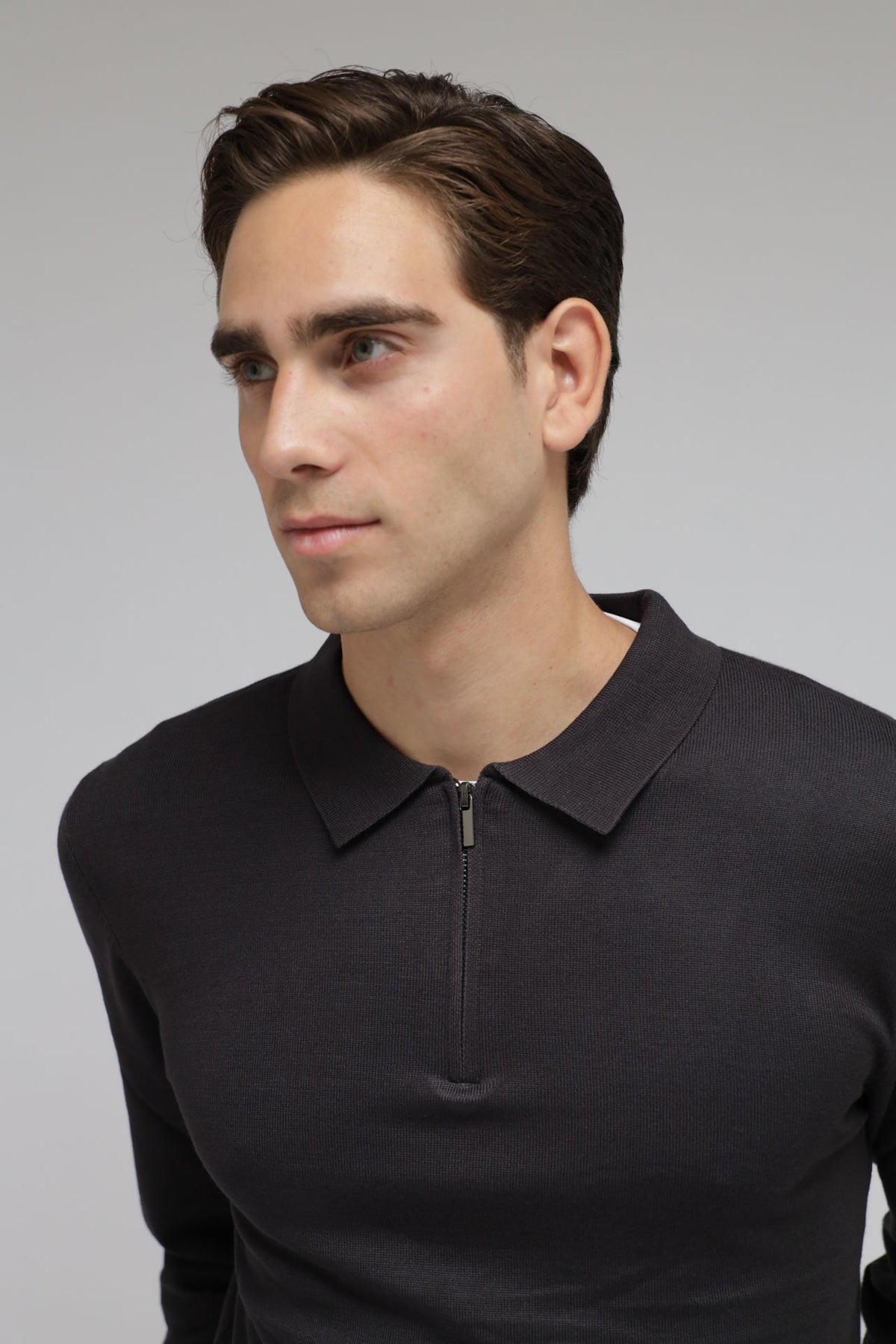 Polo con zip in maglia
