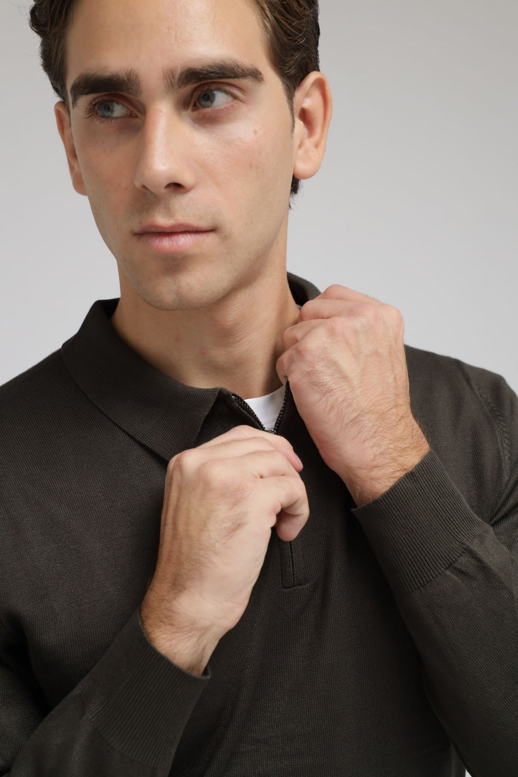 Polo con zip in maglia