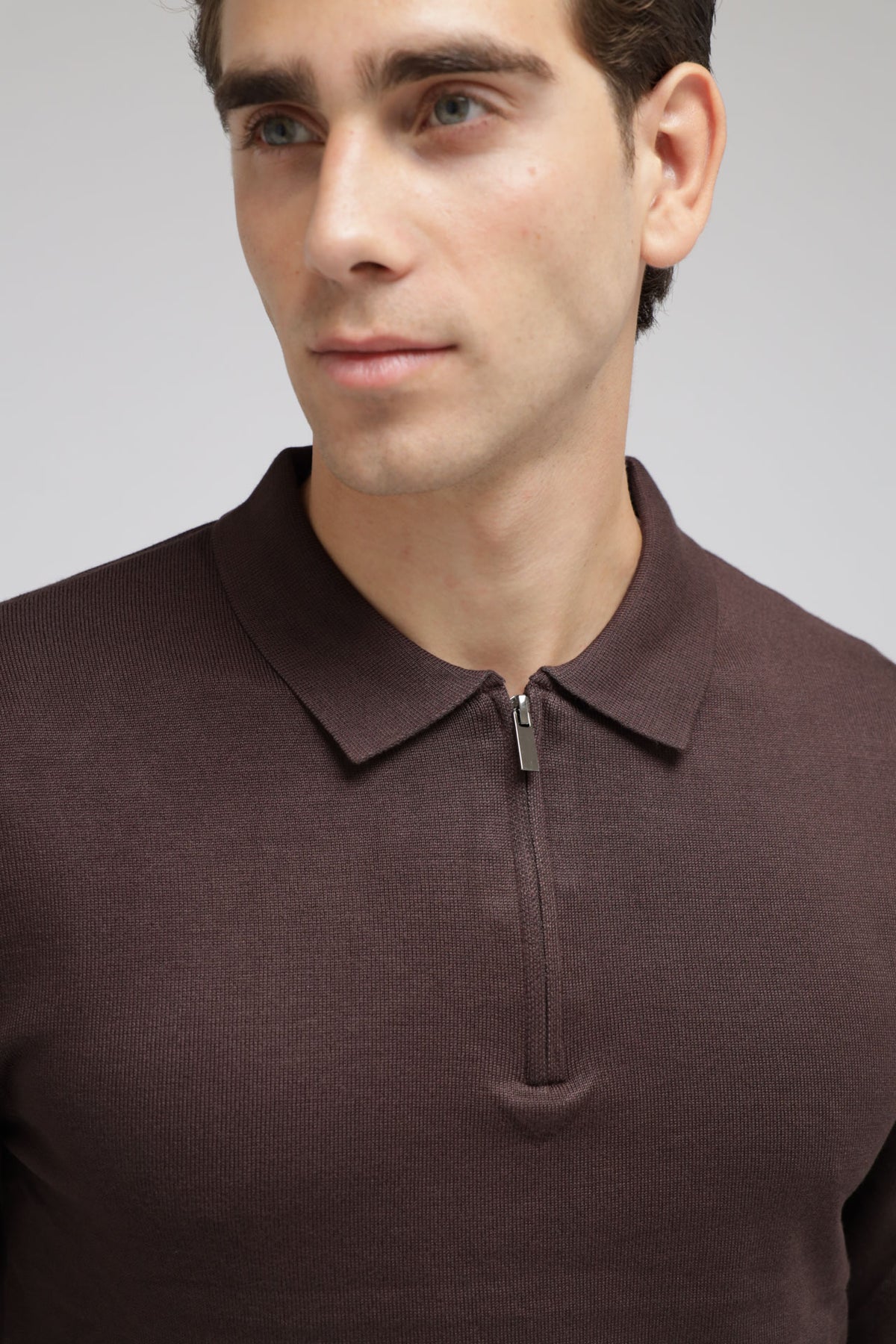 Polo con zip in maglia