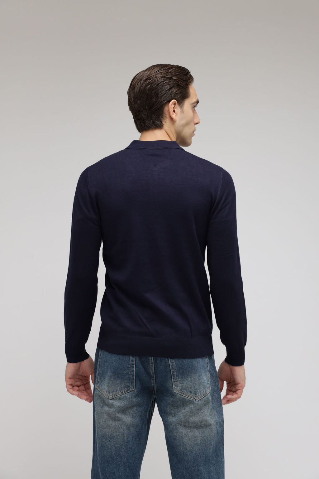 Polo con zip in maglia