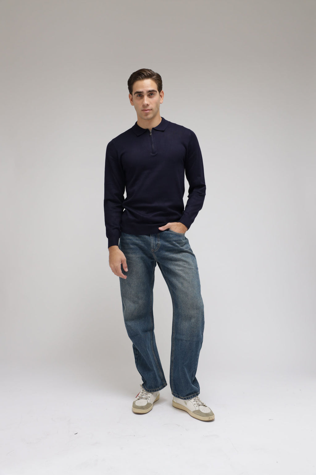 Polo con zip in maglia