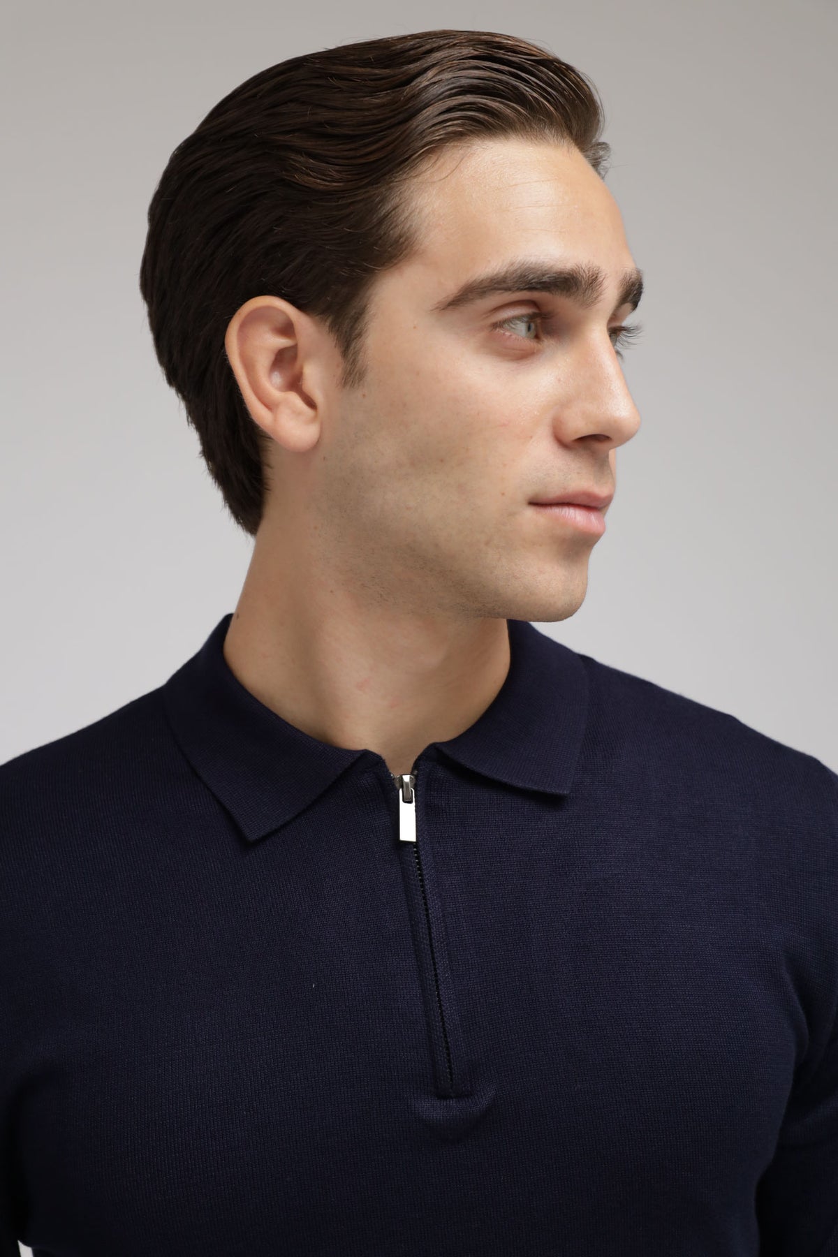 Polo con zip in maglia