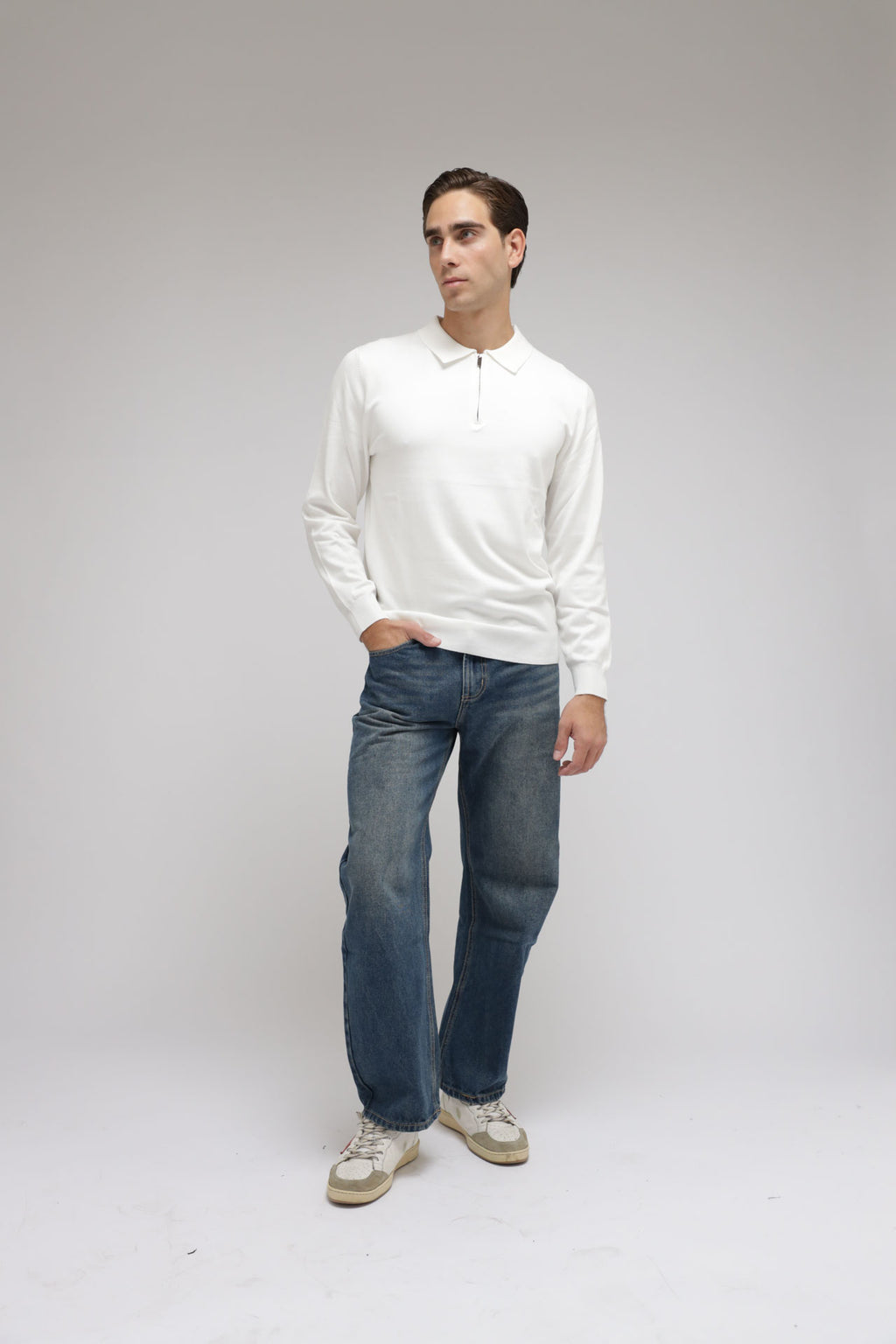 Polo con zip in maglia