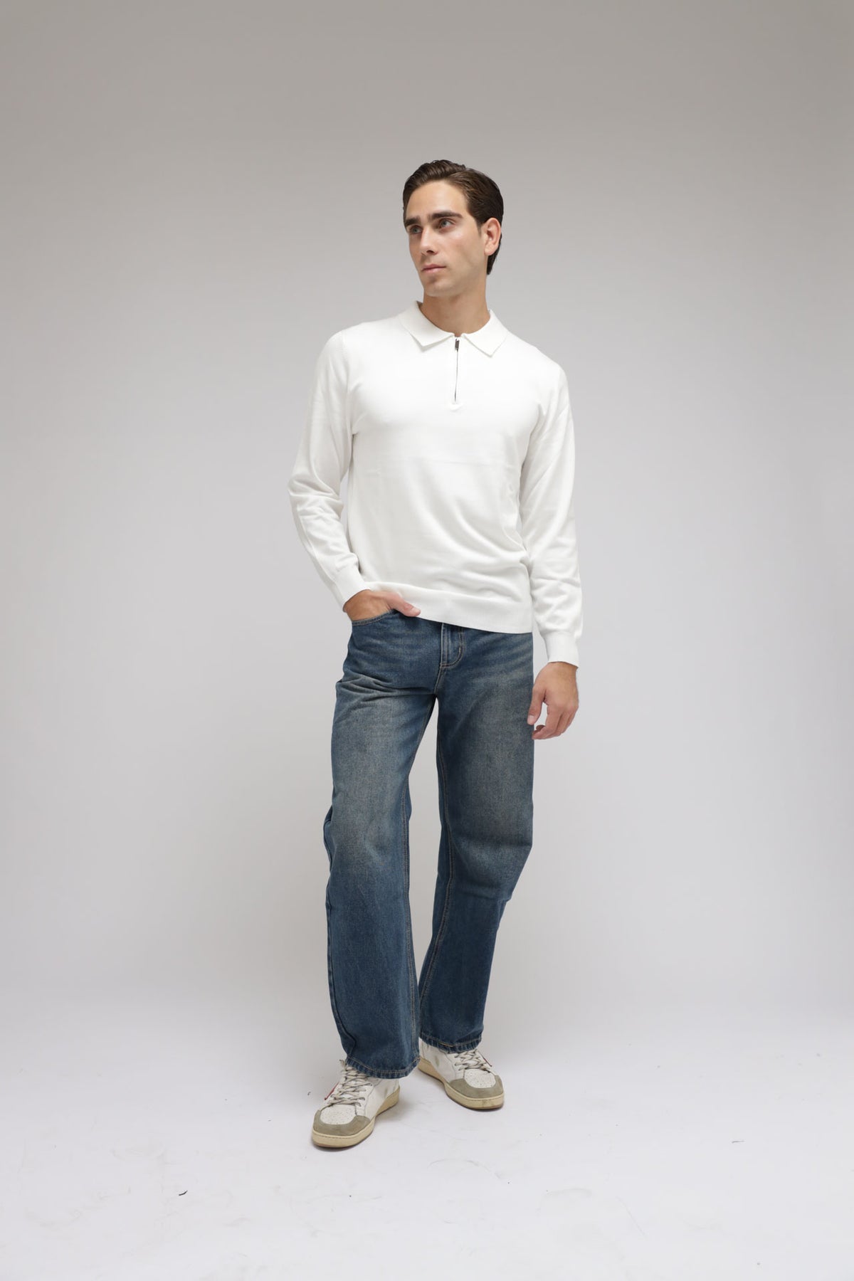 Polo con zip in maglia