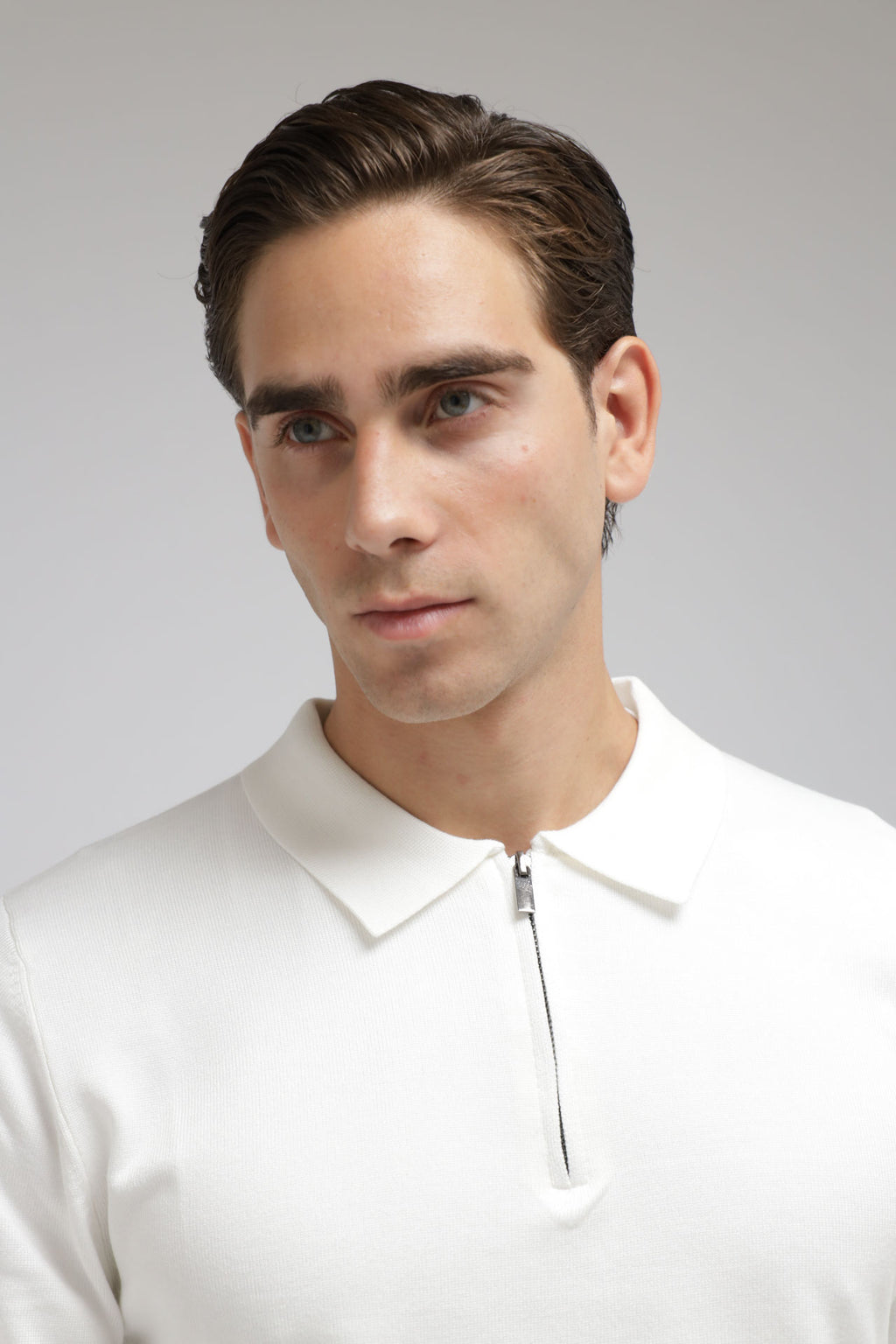 Polo con zip in maglia