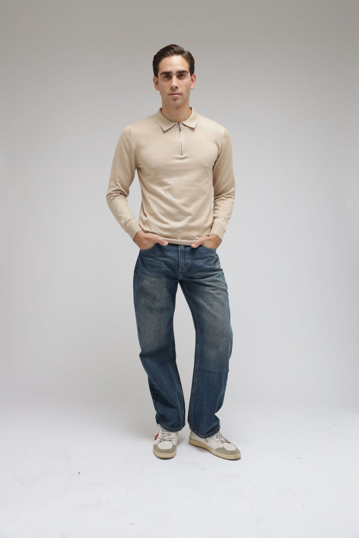 Polo con zip in maglia