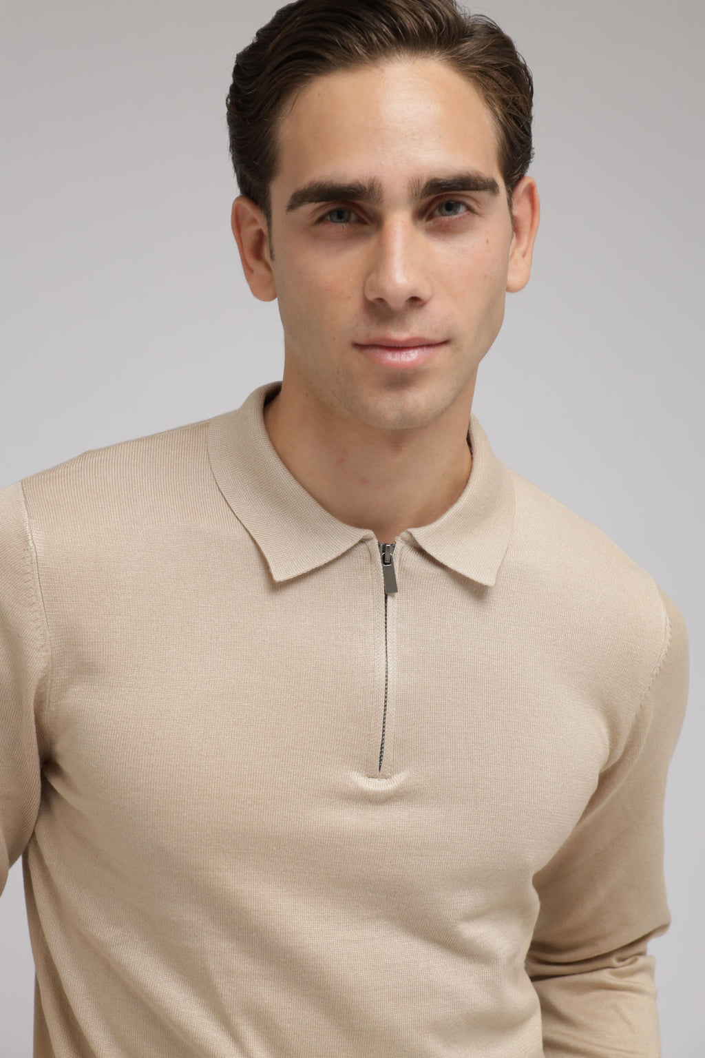 Polo con zip in maglia