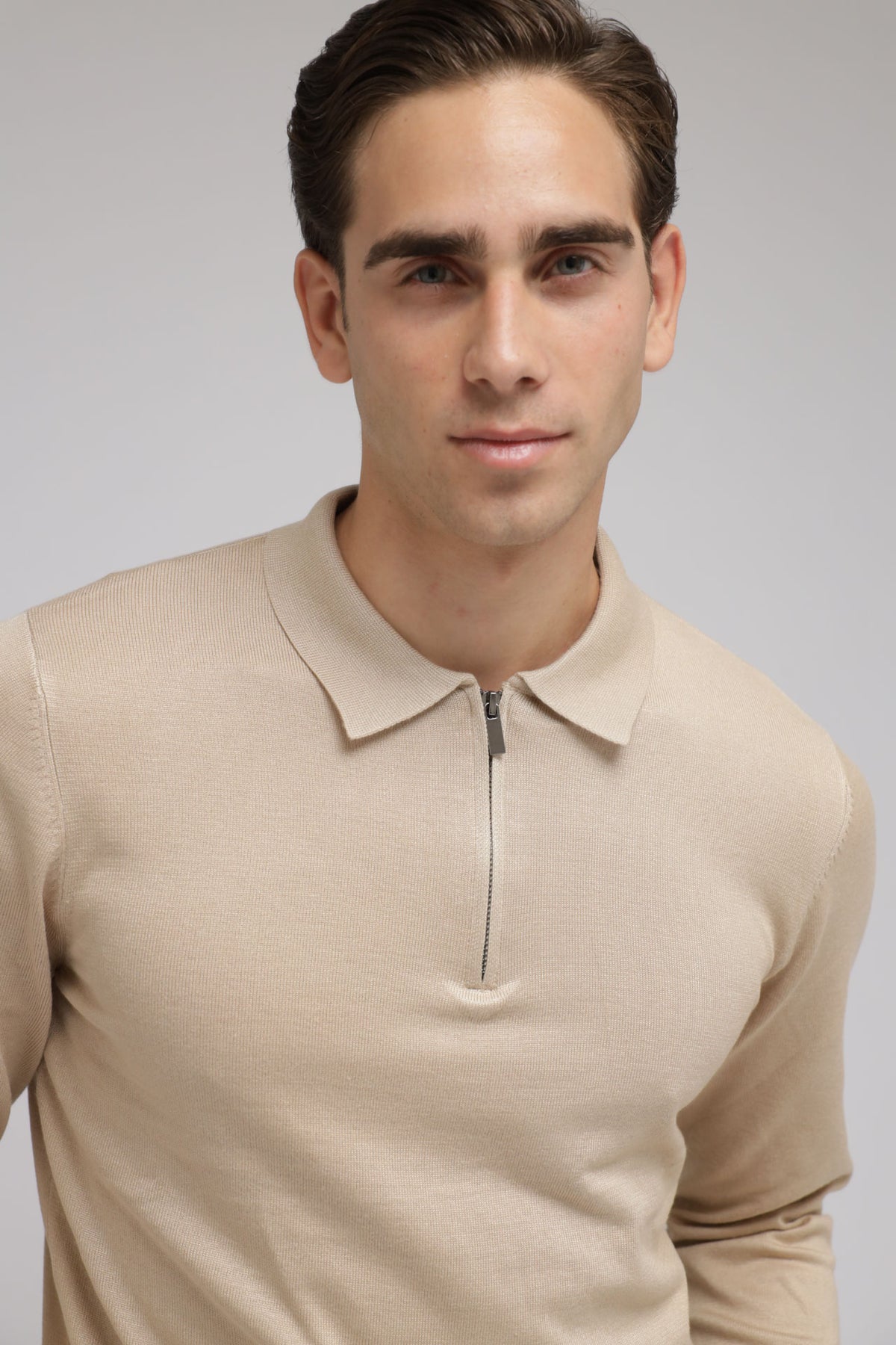 Polo con zip in maglia
