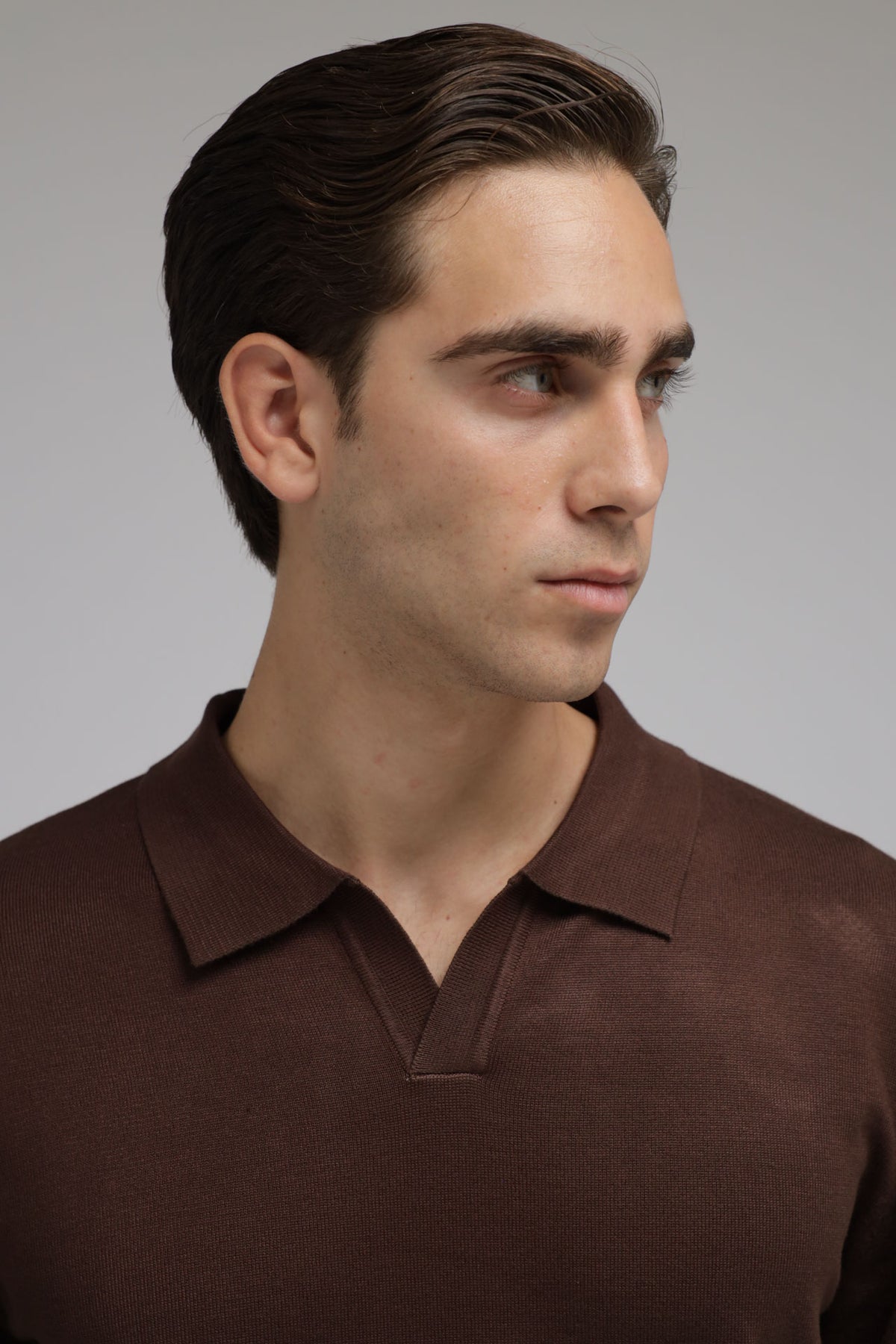 Polo scollo V in maglia