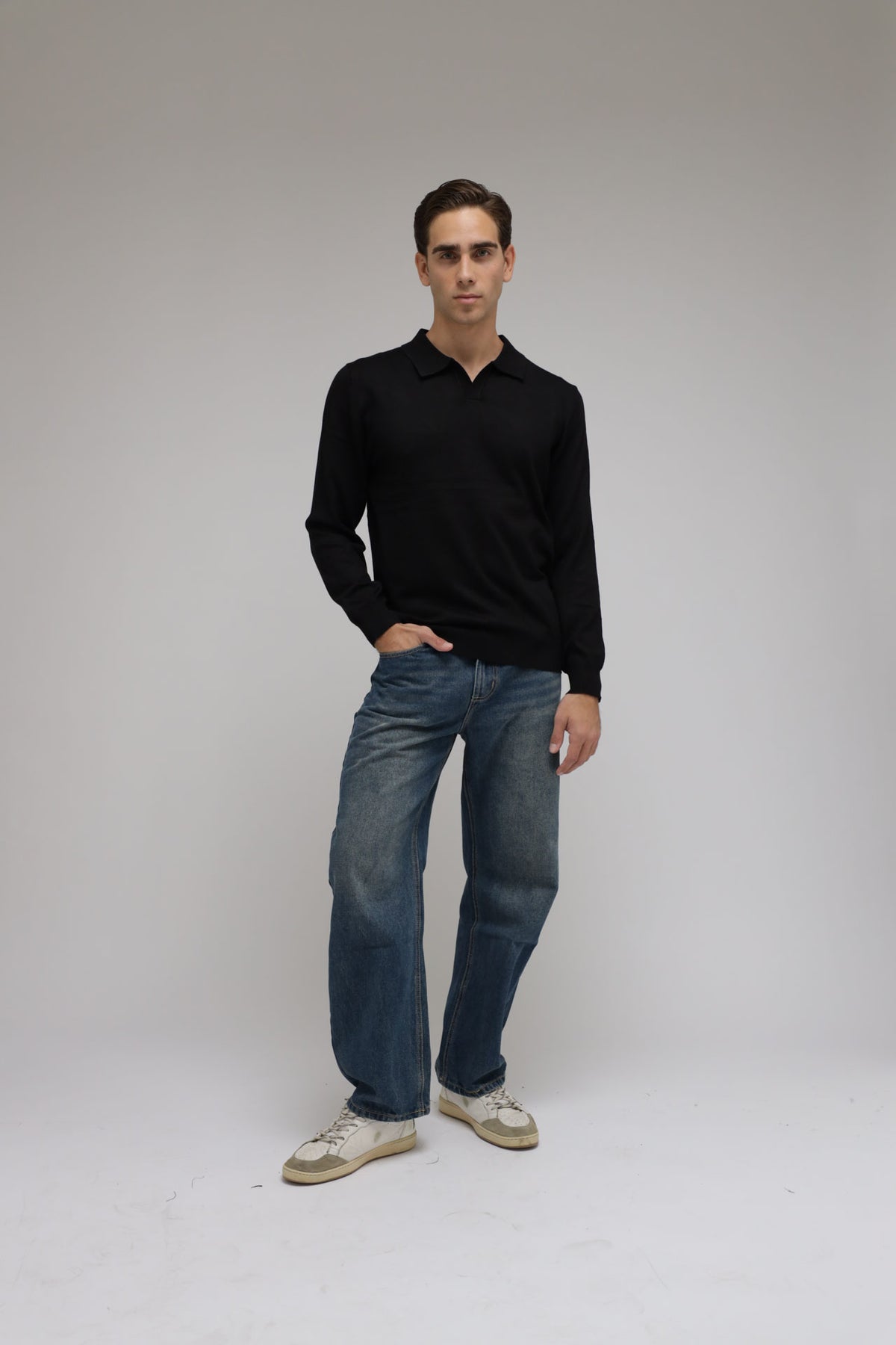 Polo scollo V in maglia
