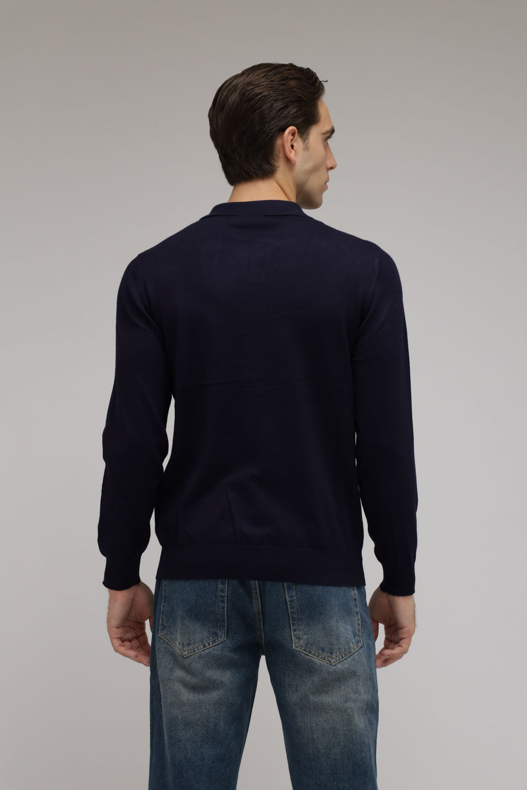 Polo scollo V in maglia