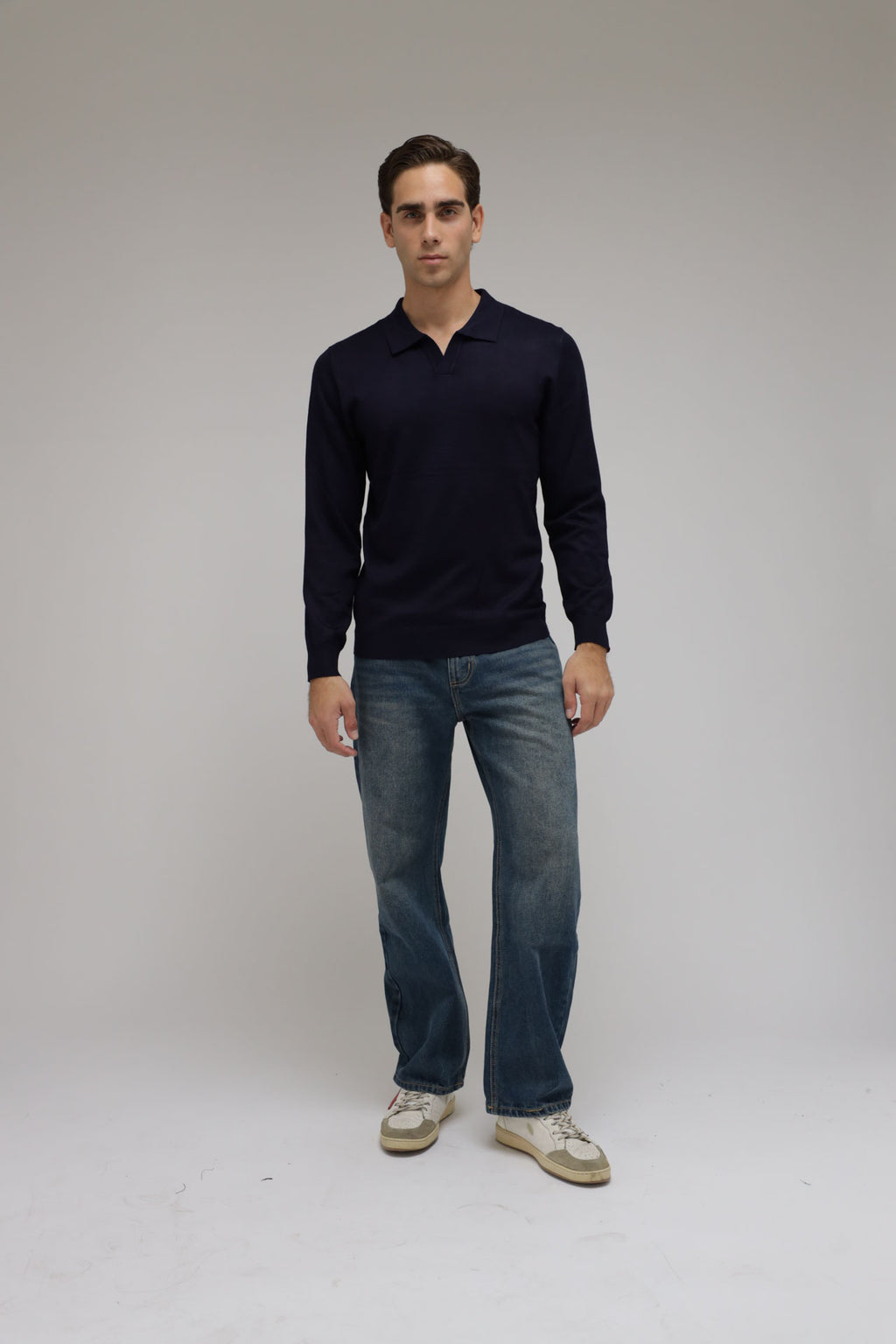 Polo scollo V in maglia